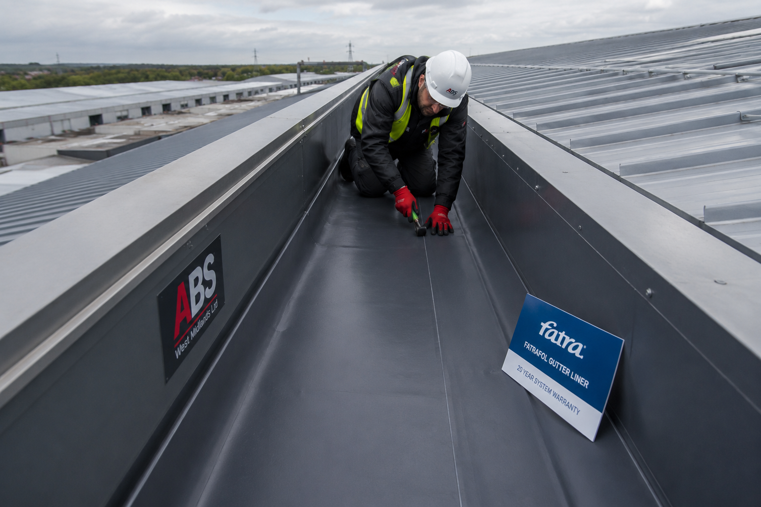 Industrial gutter maintenance and gutter lining by ABS Cladding Services