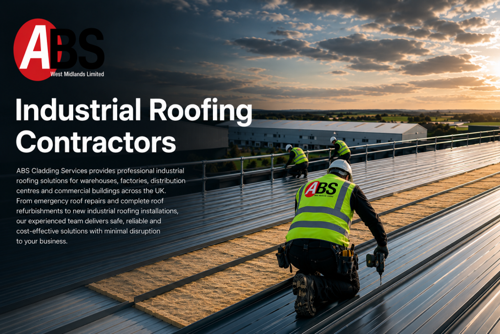 Industrial roofing contractors working on a commercial roofworking on a commercial warehouse roof